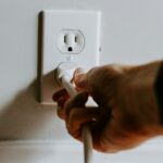 What is the reason why power surges are happening so often in your home?