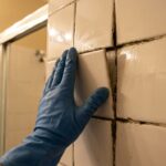 Why the Wall Around Your Shower Feels Spongy (And How to Check for Hidden Rot)